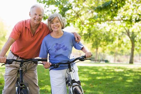 Older couple riding bikes